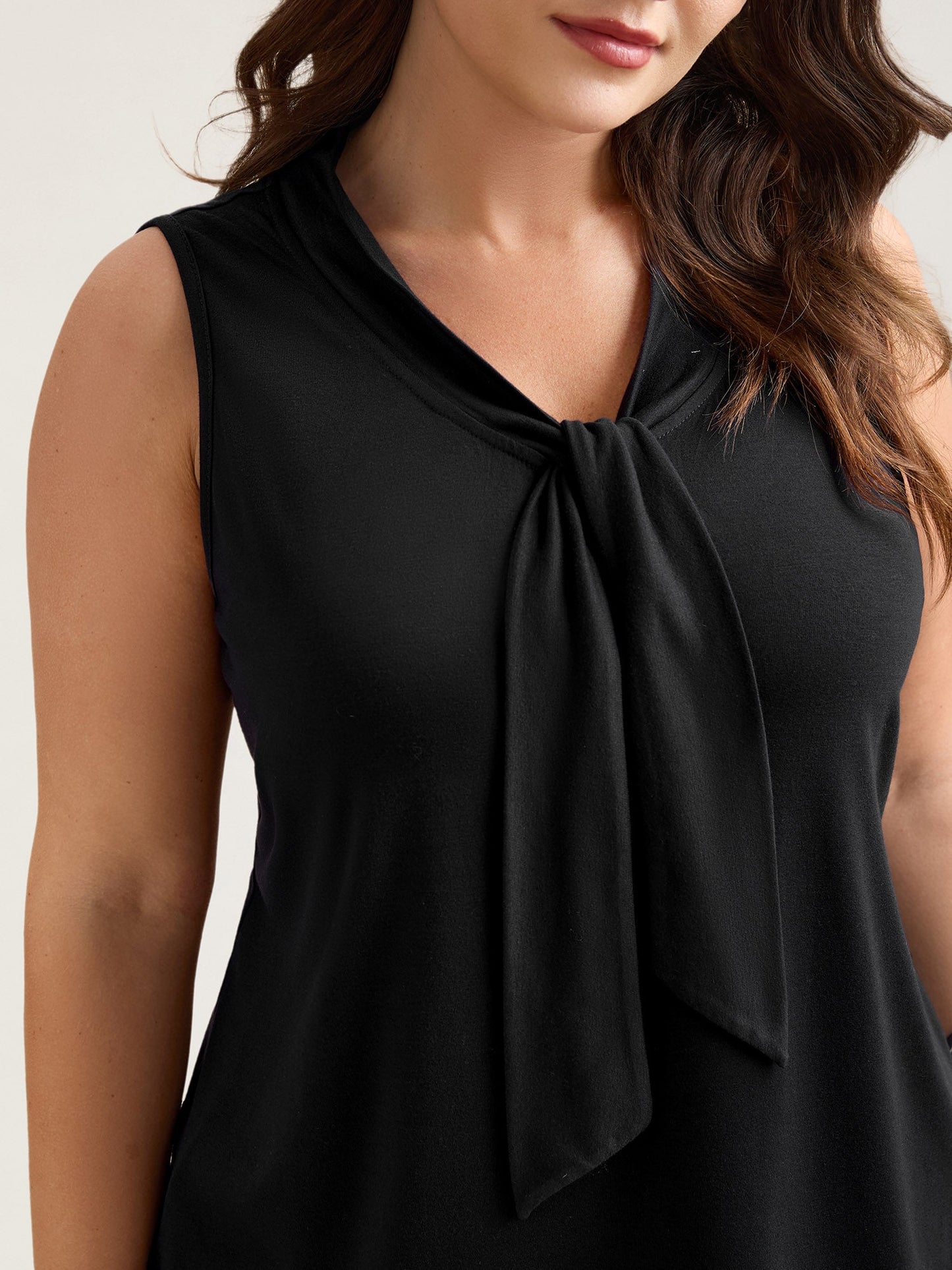 Knotted Neckline Fitted Sleeveless Blouse