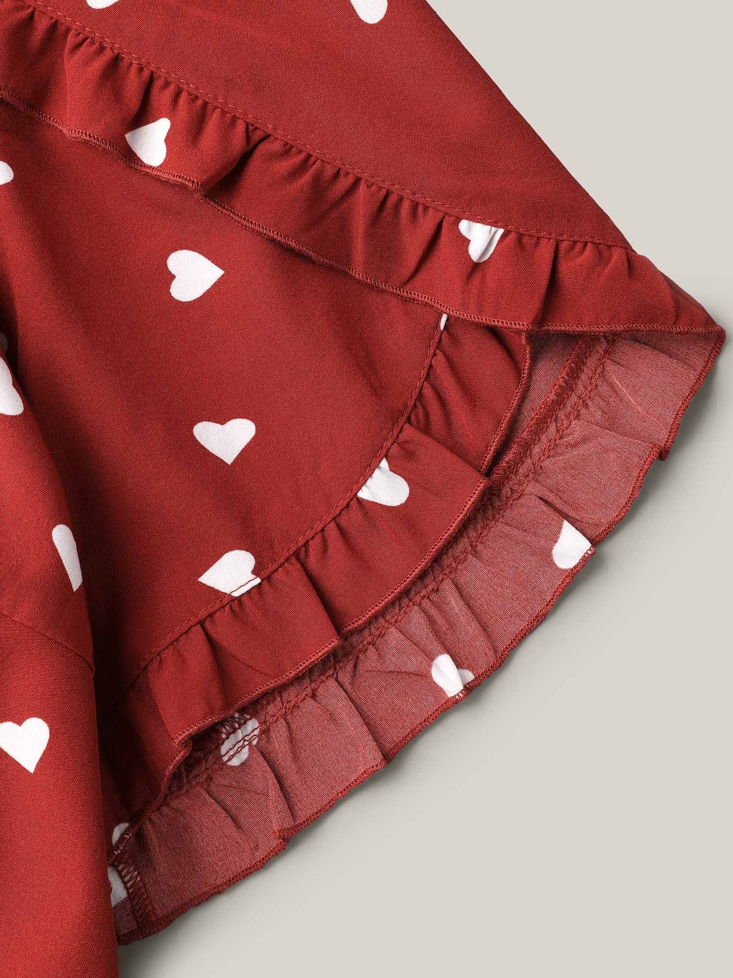 Ruffled Overlap Sleeve Heart Pattern Blouse